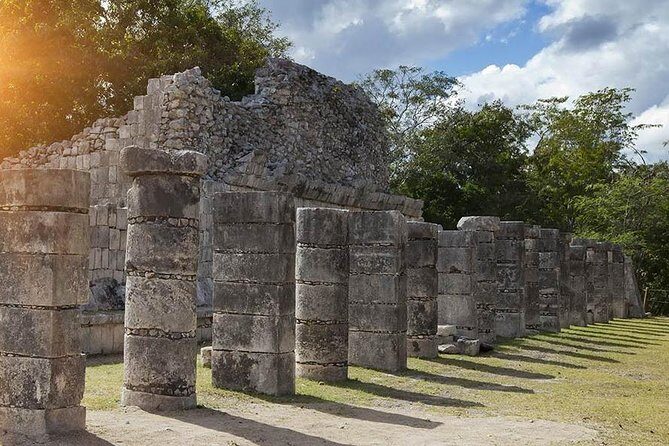 Deluxe adventure! 2 Sacred Cenotes, Chichen Itza and Valladolid from Tulum City - Ik kil Cenote: Crystal Water, Cooling Swim, and Regional Buffet
