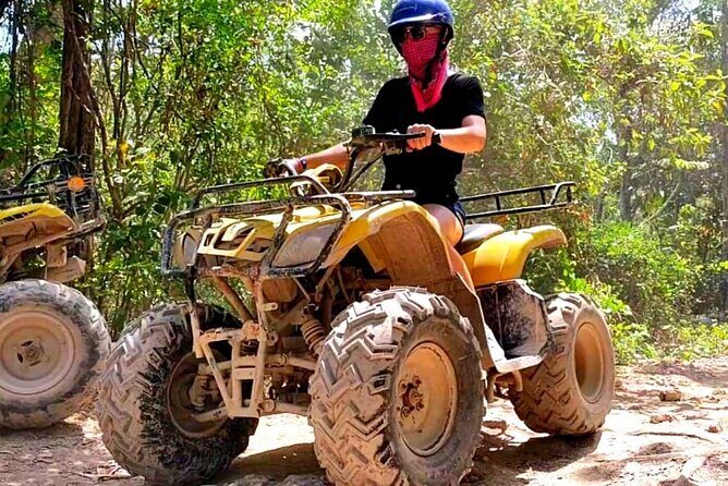 Half-day Adventure: Cenote + Ziplining + ATV Tour - ATV through jungle paths: fun control, but plan for dust