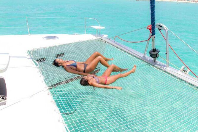 Half Day Luxury Sailing Experience in Riviera Maya with Open Bar - Snorkeling at the reef stop: stingrays, sea life, and real-world conditions
