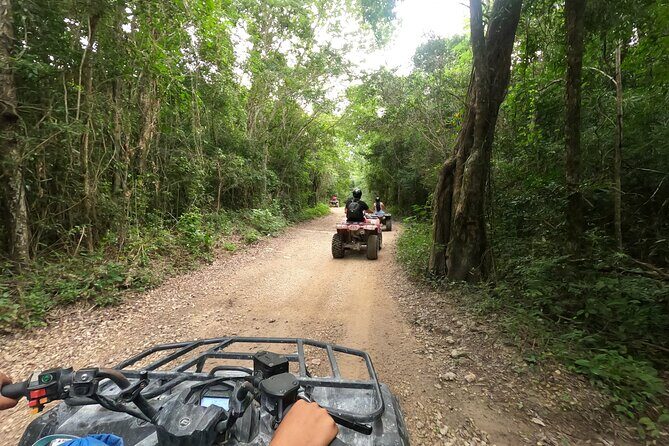 Jungle ATV Adventure: Unveiling Akumal's Enchanting Cenotes - Stop One: La Gran Cueva (Great Cave) and Its 200-Meter Scale
