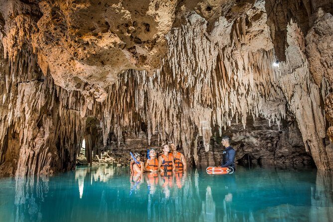 Magical Cenote and Paradise Lagoon Snorkeling Adventure - Yal-Ku Lagoon snorkeling: warm mix water and fish in a protected cove