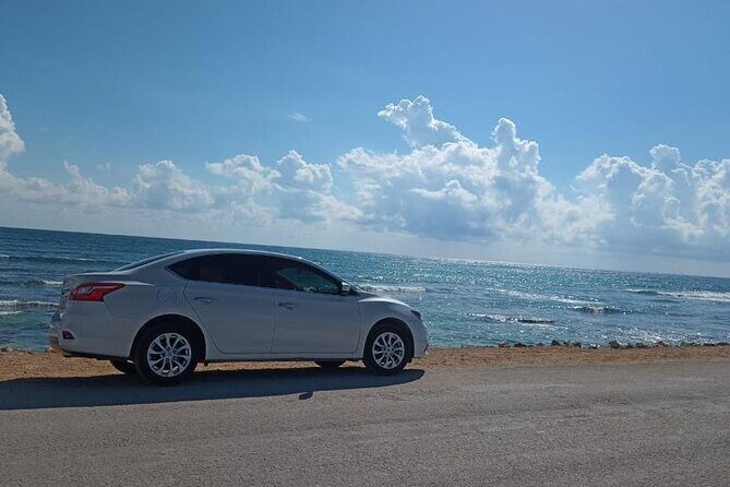 Private Transfer from Tulum to Cancun Airport – Safe & Comfortable - Price and value: $160.61 for a group, not a scramble for taxis
