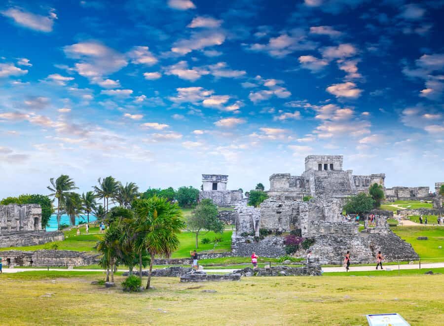 Tulum: Highlights tour including cenote, Mayan village, and German-speaking guide - Cenote Dos Palmas swim: underground rivers, clear water, and life-jacket ease